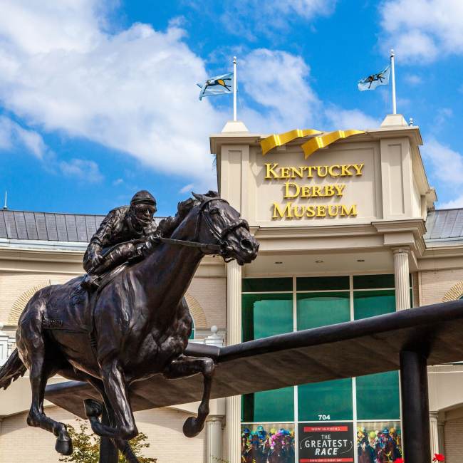 Sculpture in front of the facade of the Kentucky Derby Museum.