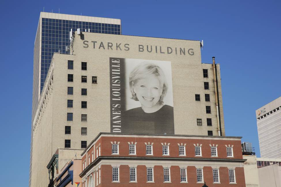 A large mural of journalist Diane Sawyer on the side of a building in Louisville, KY.