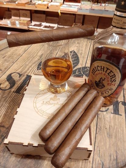 Cigars and whiskey drink from JJ Shepard Smoke and Oak in Louisville KY