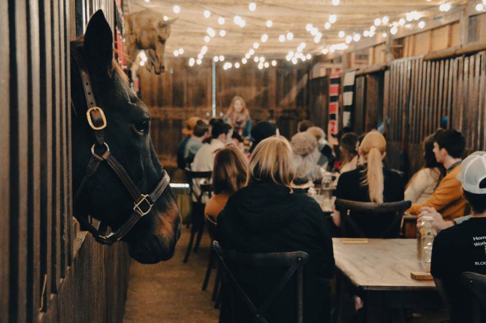 A bourbon tasting in a horse barn at Barn 6 at Hermitage Farm